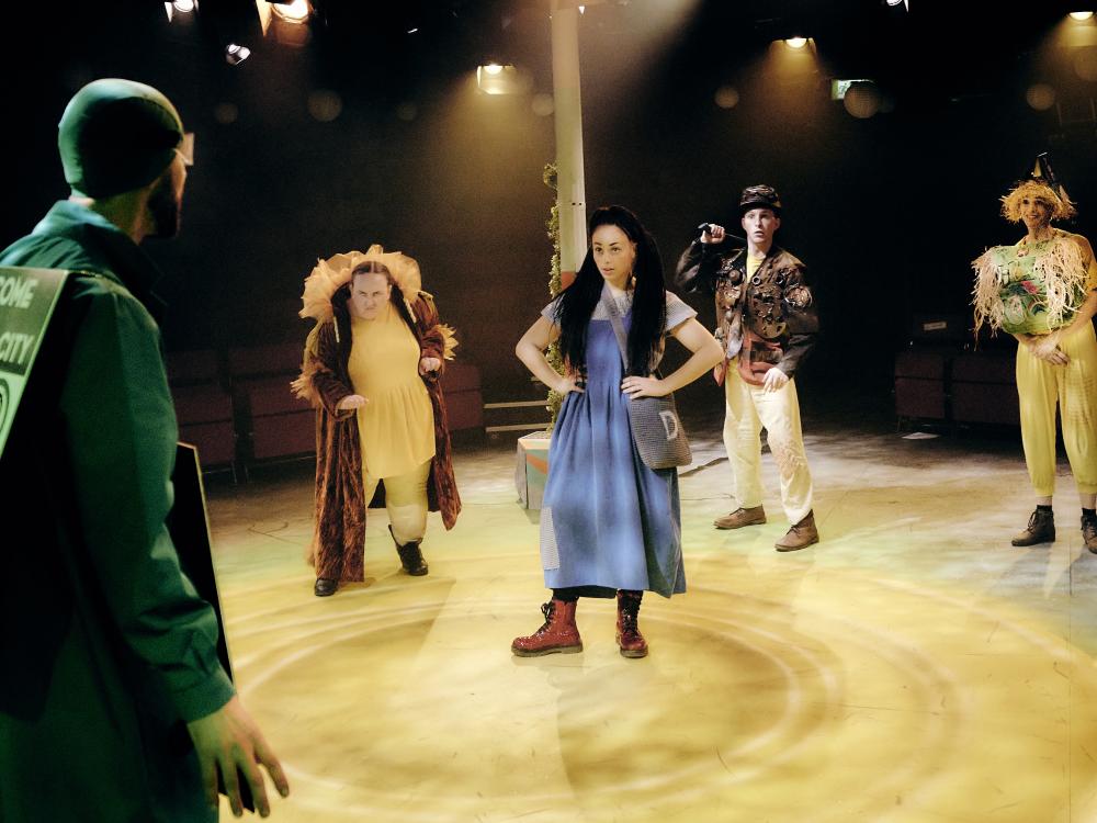 Dorothy and friends arrive at the Emerald City and meet the Guardian of the Gates.