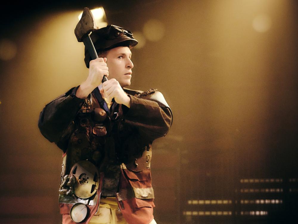 Tin Man has rusted in the rain and can't move.