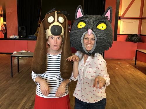 Emma Earle and Zoe Squire wearing prototype headdresses of Dog and Cat for their show Oi Frog & Friends!